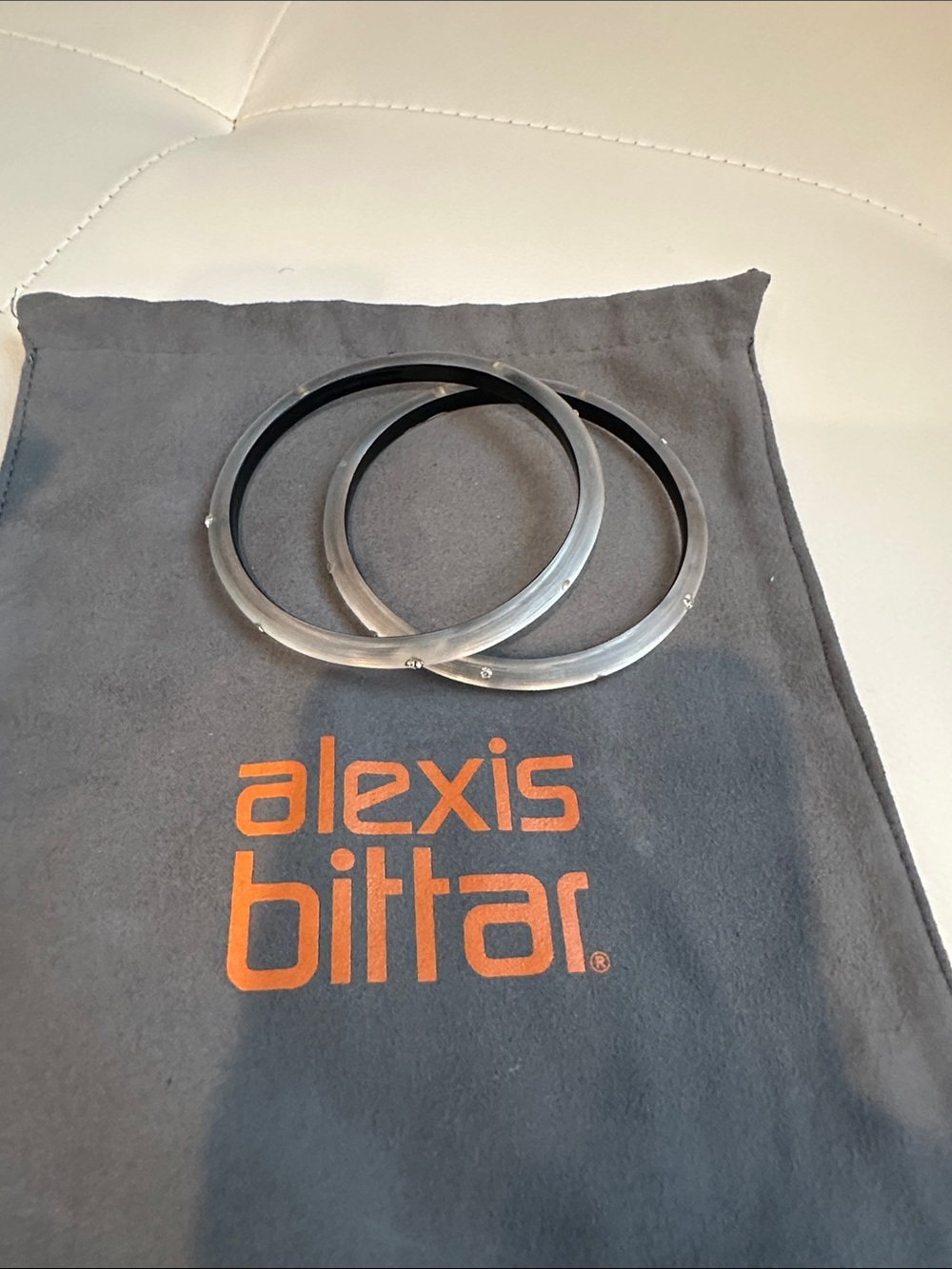 Alexis Bittar Translucent Silver-Gray Lucite Bangle Pair